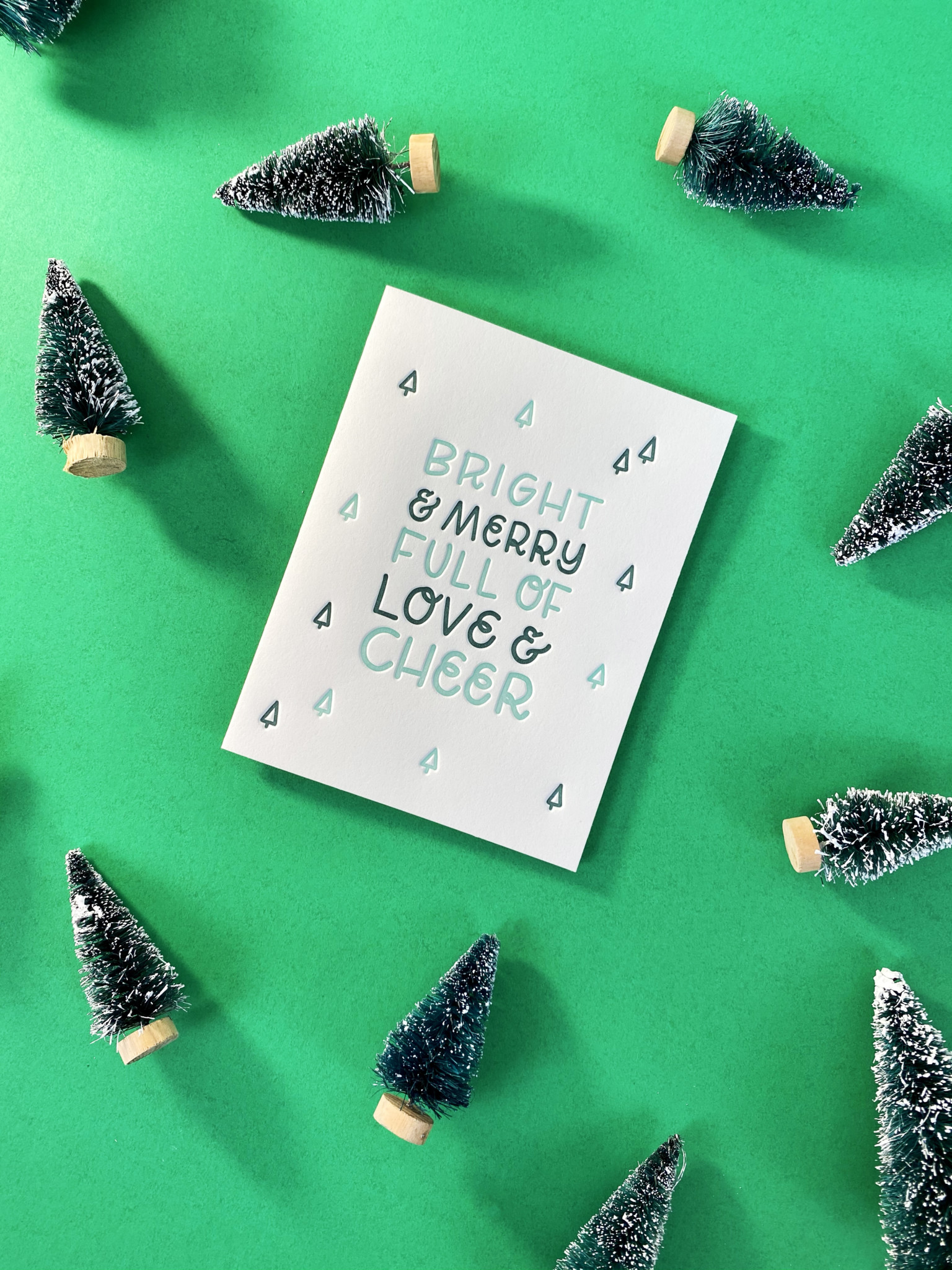 Card reads Bright & Merry, Full of Love & Cheer