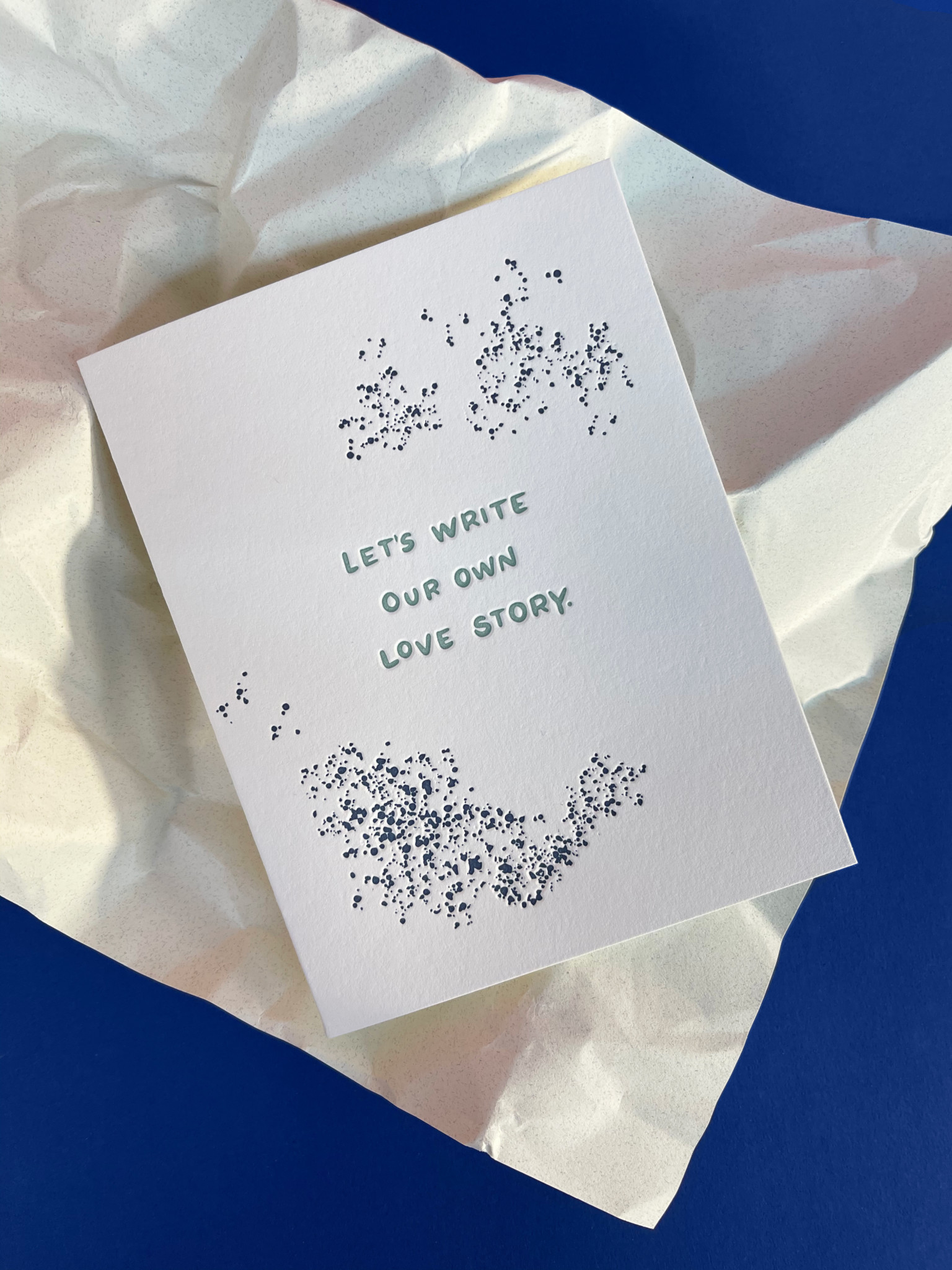 greeting card front reads "Let's write our own love story"